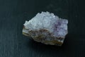 Amethyst violet variety of quartz from Brazil. Natural mineral stone on black background. Mineralogy, geology, magic of Royalty Free Stock Photo