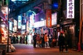 Ameyoko food street night life in Ueno district with tourists and Japanese people - Tokyo