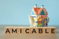 Amicable - word on wooden cubes