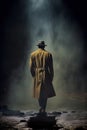 mysterious Noire film style man wearing a long pea coat and fedora. private detective. retro gangster, mafia concept. Royalty Free Stock Photo