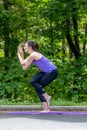 Serenity Amid Studies: Brunette College Student Finds Balance with Campus Yoga Break