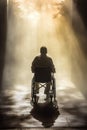 Wheelchair User seeking healing. God's light rays shining down. Inclusion, respect, equality, dignity and Empowerment. Royalty Free Stock Photo