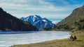 Mountain Oasis: Hikers Take Reprieve in Panoramic Pyrenees Splendor.