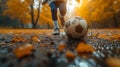 Lone Kid Kicking Ball on Muddy Field (AI-Generated) Royalty Free Stock Photo