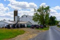 Amish Buggies Parked at White Barn Royalty Free Stock Photo