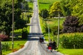 Amish Buggies Travel on Rural Lancaster County Road Royalty Free Stock Photo
