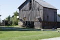 Amish buggy and old barn in the country Royalty Free Stock Photo