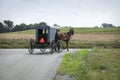 Amish buggy turns a corner in Lancaster County Pennsylvania Royalty Free Stock Photo