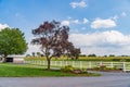 Amish country corn field, road trees fence and flowers in Lancaster, PA US Royalty Free Stock Photo