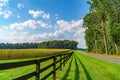 Amish country field agriculture, beautiful brown wooden fence, farm, barn in Lancaster, PA US Royalty Free Stock Photo