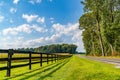 Amish country field agriculture, beautiful brown wooden fence, farm, barn in Lancaster, PA US Royalty Free Stock Photo