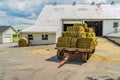 Amish country hay loaded wagon on the farm barn agriculture in Lancaster, PA US Royalty Free Stock Photo