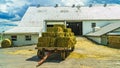 Amish country hay loaded wagon on the farm barn agriculture in Lancaster, PA US Royalty Free Stock Photo