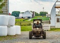 Amish Country, Lancaster PA US - September 4 2019, Amish man works on a farm