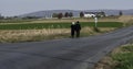 Amish Couple Walking 2