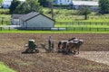 Amish Farmer Plowing Field After Corn Harvest with 6 Horses