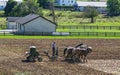Amish Farmer Plowing Field After Corn Harvest with 6 Horses Royalty Free Stock Photo