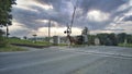 Amish Horse and Buggy Crossing a Rail Road Crossing on a Dramatic Summer Day Royalty Free Stock Photo