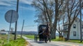 Amish Horse and Buggy Trotting to Country Store Royalty Free Stock Photo