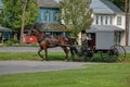 Amish Horse and Buggy Trotting to Country Store Royalty Free Stock Photo