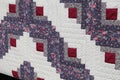 Amish rectangle square pattern of quilt close up of top