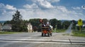 Amish Teenagers Riding on a Small Wagon Pulled my a Miniature Pony Royalty Free Stock Photo