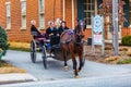 Amish Women Riding in Tall Wagon in Intercourse Village