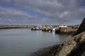 Amlwch Harbour with fishing boats moored. Amlwch Port, Anglesey, Wales, United Kingdom. 23rd March 202 Royalty Free Stock Photo