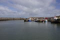 Amlwch Harbour with fishing boats moored. Amlwch Port, Anglesey, Wales, United Kingdom. 23rd March 202 Royalty Free Stock Photo