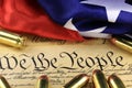 Ammunition and flag on US Constitution - History of the Second Amendment