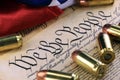 Ammunition and flag on US Constitution - History of the Second Amendment Royalty Free Stock Photo