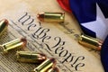 Ammunition and flag on US Constitution - History of the Second Amendment Royalty Free Stock Photo