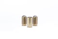 Ammunition for traumatic weapons. Three bullets with a rubber bullet Royalty Free Stock Photo
