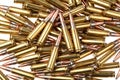 Ammunition for weapons. Lots of rifle cartridges on a white back Royalty Free Stock Photo