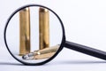 Ammunition on a white background. View through a magnifier. Isolated. Close up. Weapons. Bullets Royalty Free Stock Photo