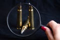 Ammunition on a white background. View through a magnifier. Isolated. Close up. Weapons. Royalty Free Stock Photo