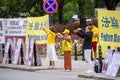 Amnesty International demonstration in front of the Warsaw Senate in Polgne to defend the practice of Falun Dafa Royalty Free Stock Photo