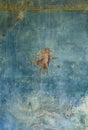 Amorino fresco in a Domus of the ancient Pompeii Royalty Free Stock Photo