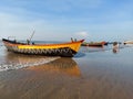 Decorated fishing boats are waiting on Mandarmani sea beach.