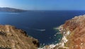 Amoudi Bay nestled beneath the red cliffs of the village of Oia, Santorini Royalty Free Stock Photo
