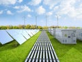 Amount of energy storage systems or battery container units with solar and turbine farm Royalty Free Stock Photo