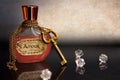 Amour love potion with chain and key around the bottle Royalty Free Stock Photo