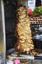 Kebab or shawarma is sold by hawkers in small roadside shops as a takeaway dish. Royalty Free Stock Photo