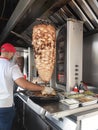 Kebab or shawarma is sold by hawkers in small roadside shops as a takeaway dish. Royalty Free Stock Photo