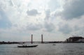 Ampera bridge, Musi river and boats.