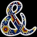 Beaded huichol art ampersand symbol