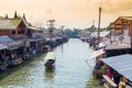 Amphawa floating market with traditional Mae Klong river side village