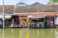 Amphawa floating market with traditional Mae Klong river side village