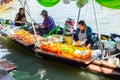 Amphawa food sale on wooden boat traditional Mae Klong canals river Royalty Free Stock Photo