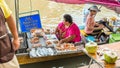 Amphawa, Samut Songkhram Province, Thailand: two vendors cook and sell seafood dishes from a boat at Amphawa Floating Market Royalty Free Stock Photo